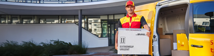 DHL Medical Express courier collecting the validated Medical Box from a hospital with a DHL branded van in the background.